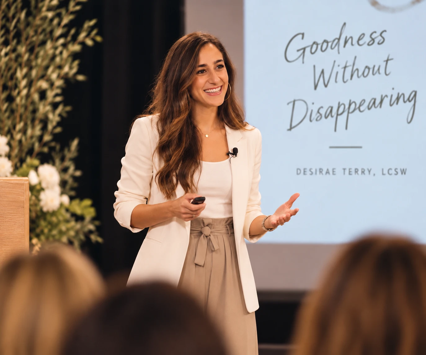 Desirae Terry speaking on stage